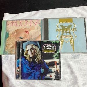Three Madonna cds.